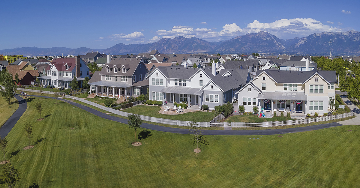 A residential community next to an open field